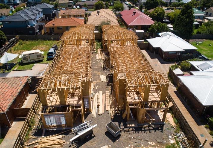 Four homes being constructed on the same block of land